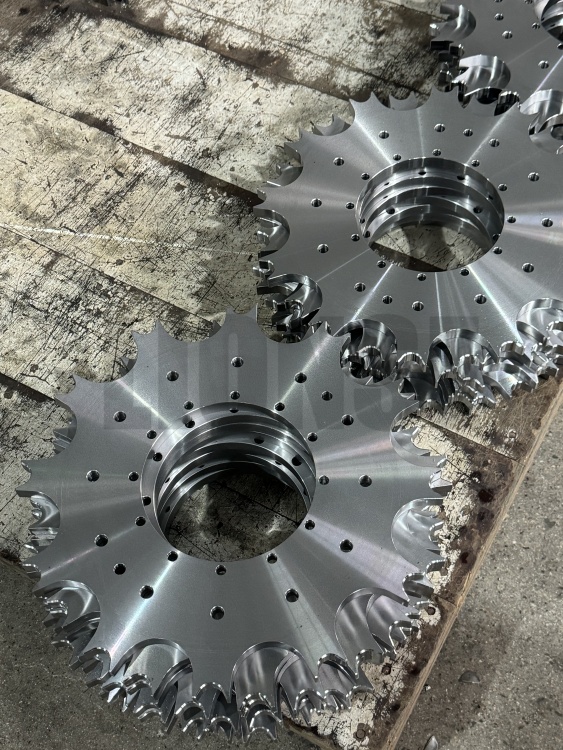 Apakah fungsi utama sproket dalam peralatan mekanikal?